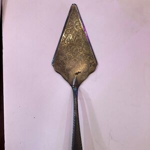 - Vintage Silver Plated Pie Utensil.